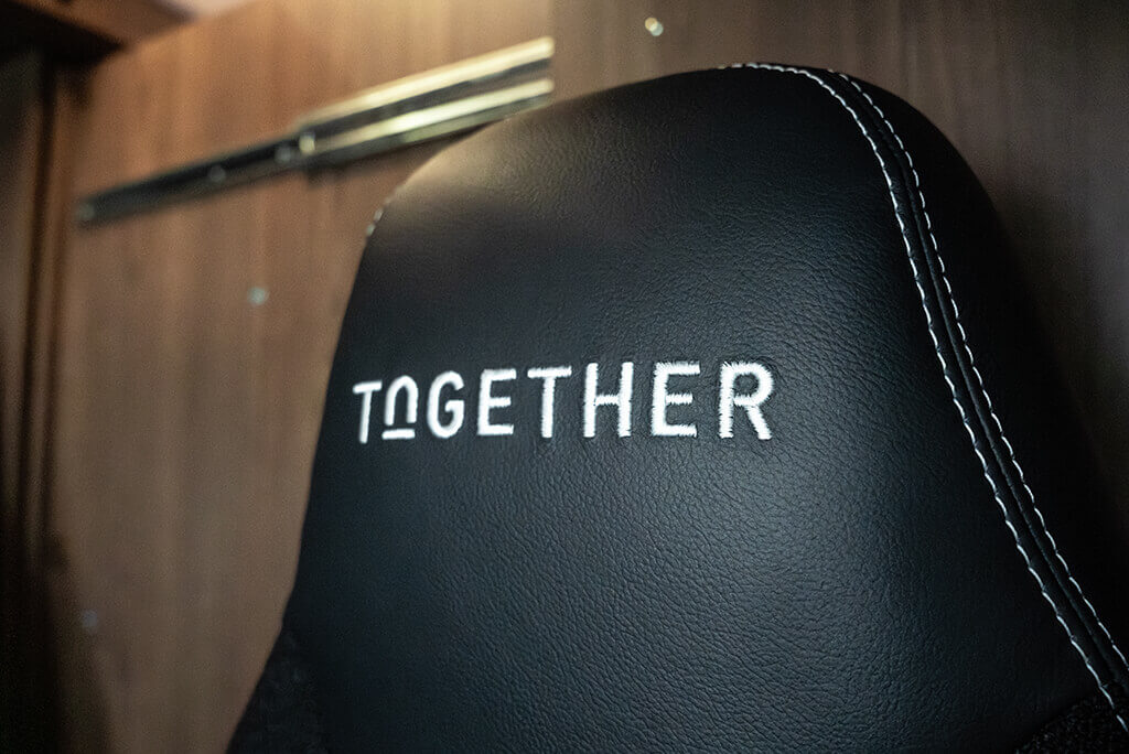 FRANKIA Edition TOGETHER – Detail Headrest with Embroidered Inscription FRANKIA TOGETHER – Enhanced Headrests